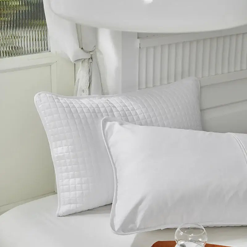 White quilted decorbites cotton pillowcase with diamond-stitched pattern and soft plush fabric for bedroom decor
