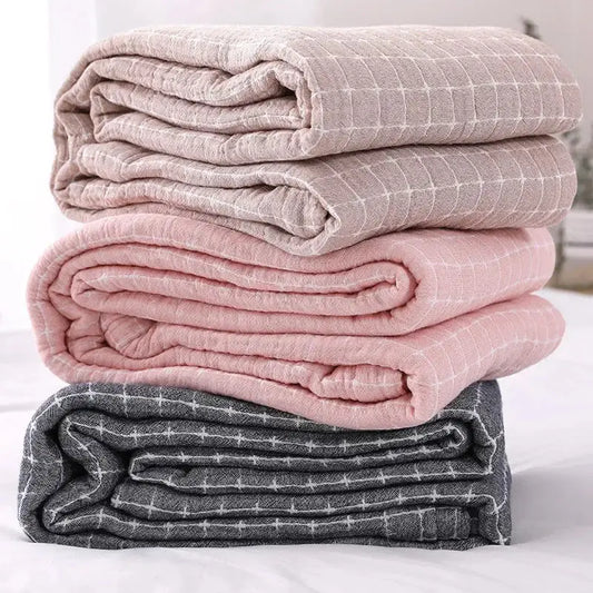 Stacked quilted grid cotton gauze sofa cover blankets in beige pink and gray for decorbites cotton gauze sofa decor