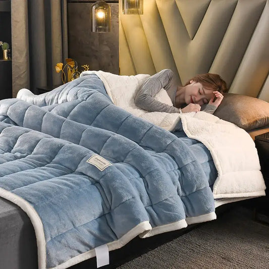 Quilted light blue and white bed blanket with cozy coral fleece soft plush texture perfect for bedroom decorbites cozy coral