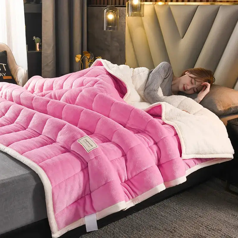 Pink quilted fleece bed blanket with white sherpa lining from decorbites cozy coral fleece collection for warmth and comfort