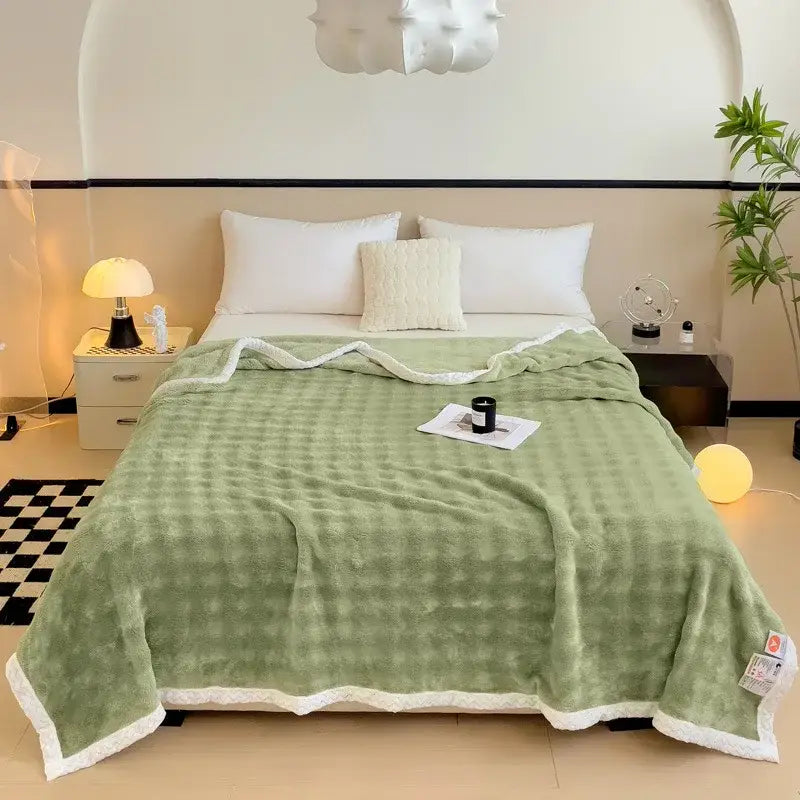 A soft moss green fleece blanket with white sherpa trim featuring decorbites imitation rabbit velvet warm fabric