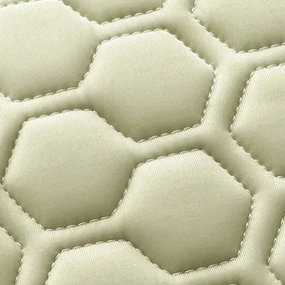 Beige quilted fabric with hexagonal stitching pattern on decorbites cooling mat for bedroom bedding set