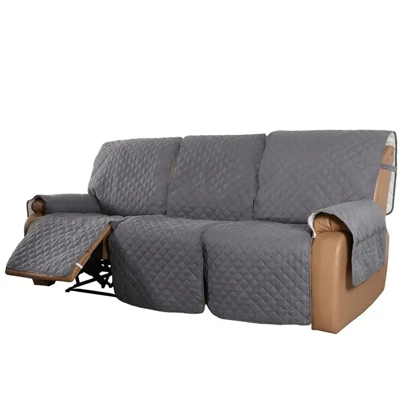 Gray quilted recliner sofa cover with diamond-stitched pattern designed for living room protection and style