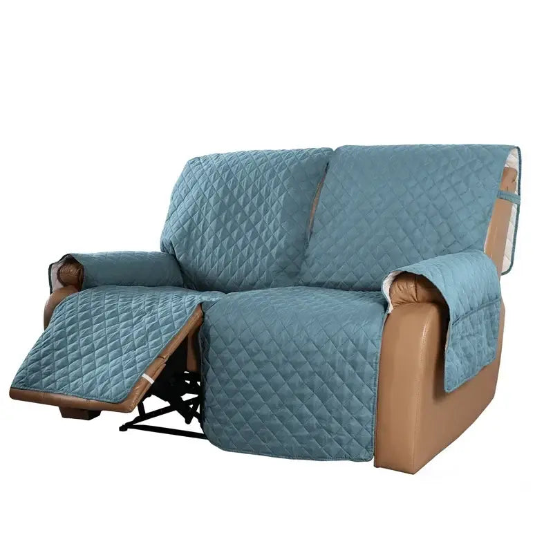 Light blue quilted recliner sofa cover with diamond stitching pattern water repellent for living room use