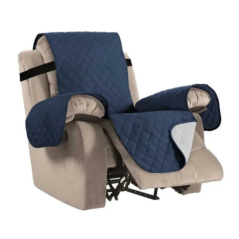 Navy blue quilted fabric recliner slipcover with black straps designed for living room chair protection and comfort
