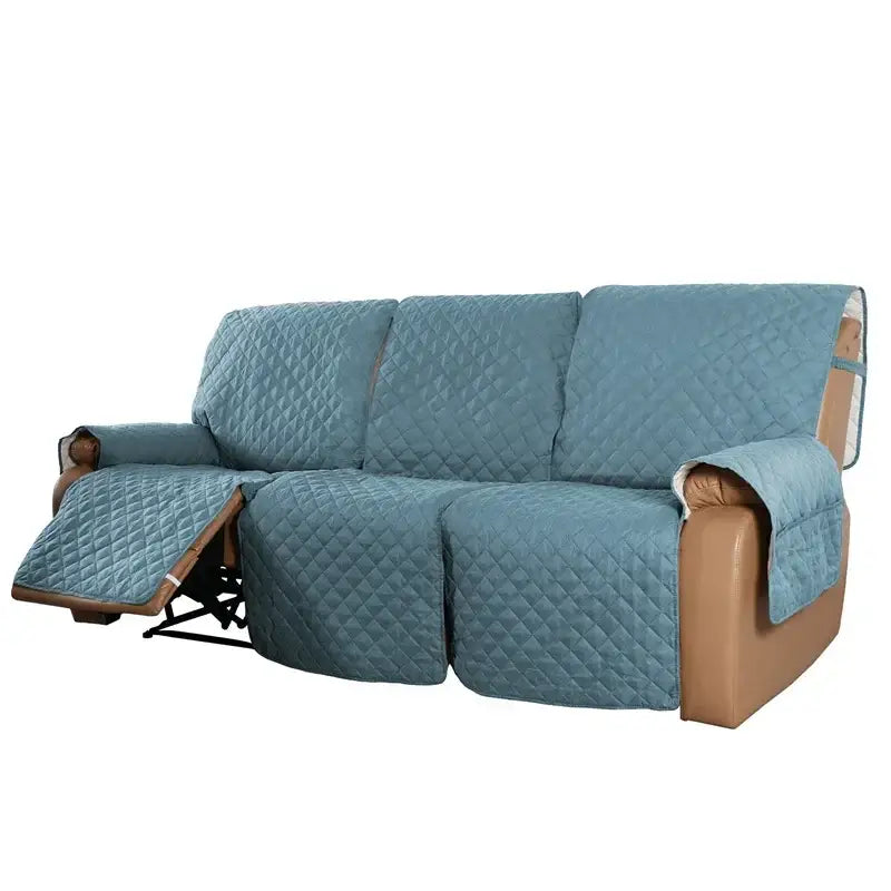 Quilted teal recliner slipcover with diamond stitching and soft padded interior lining for living room use