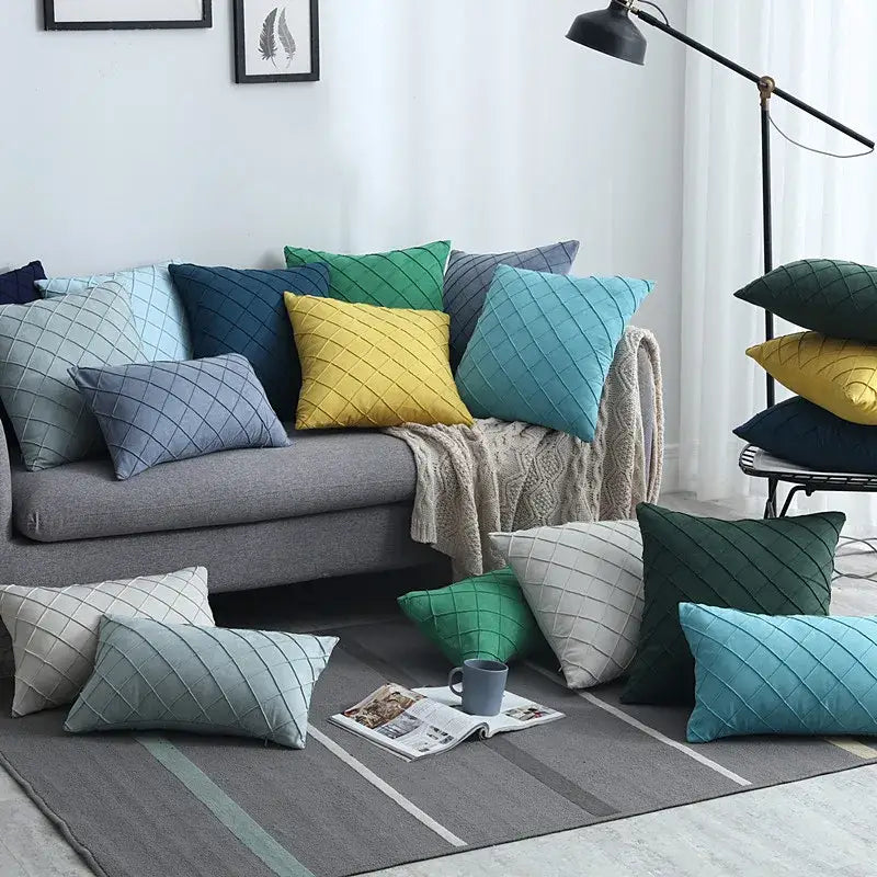 A collection of colorful quilted velvet lattice cushion covers with diamond-stitched pattern for living room use