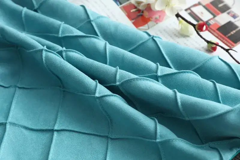 Teal quilted velvet cushion cover with stitched diamond lattice pattern for living room embroidered lattice cushion