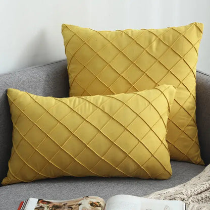 Two mustard-yellow quilted velvet lattice cushion covers made of soft fabric for living room decoration