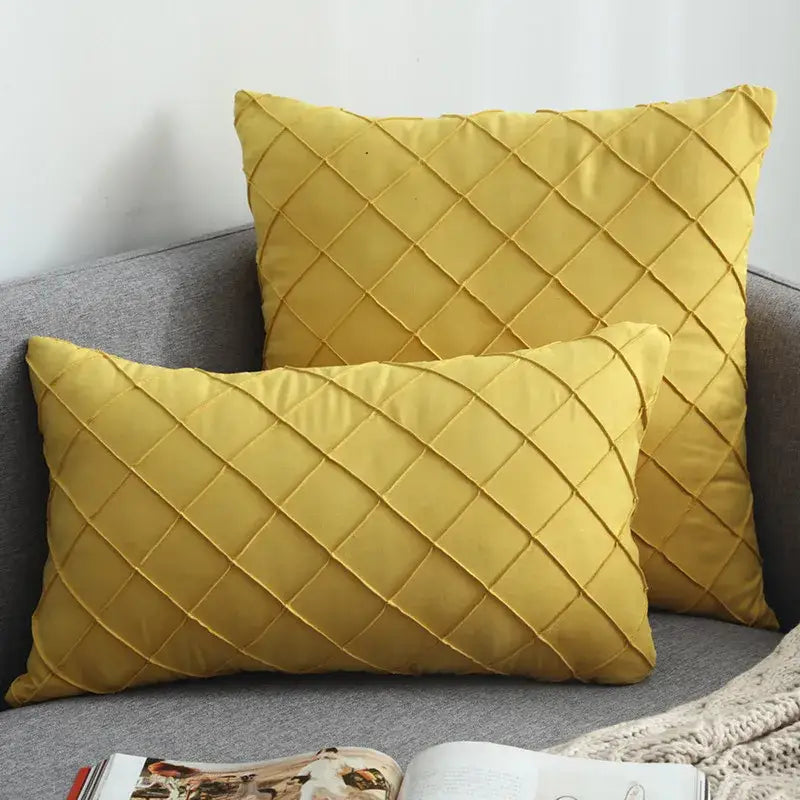 Two mustard-yellow quilted velvet lattice cushion covers made of soft fabric for living room decoration