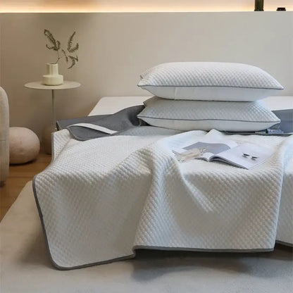 White quilted cooling mat and pillowcase set with gray trim for bedroom decorbites ice bean collection