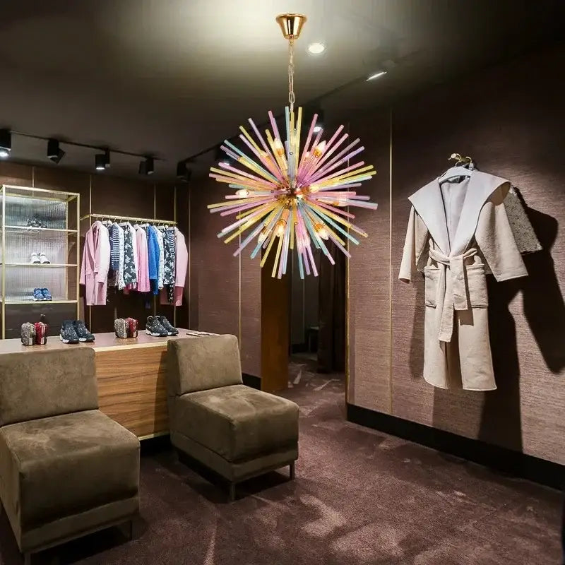 A vibrant pastel glass dandelion chandelier pendant light with colorful rods and gold-toned decorbites fixture