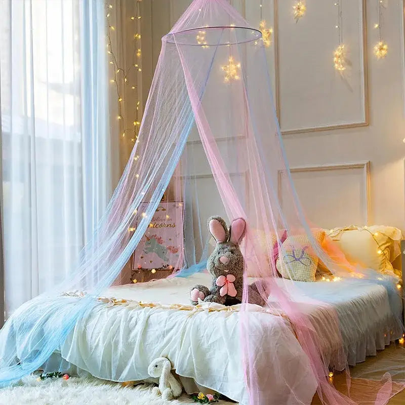 Pastel pink and light blue sheer mesh hanging mosquito nets with a circular metal frame and star lights canopy