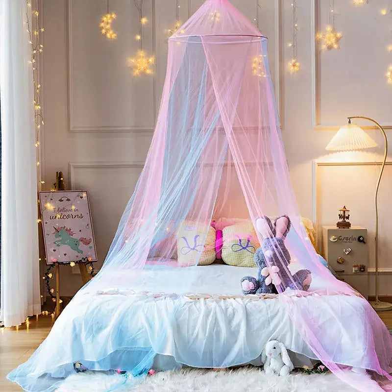 Pastel pink and light blue sheer hanging mosquito nets with star lights conical canopy draped elegantly over a bed