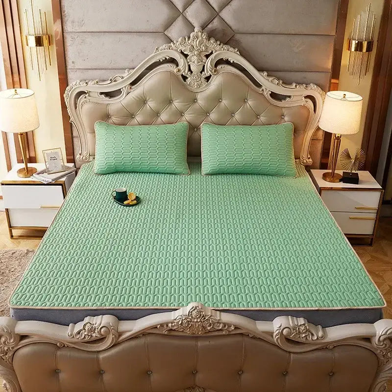 Mint green quilted bed pad with subtle texture and soft padding in decorbites cartoon print mattress set bedroom quilted cushion