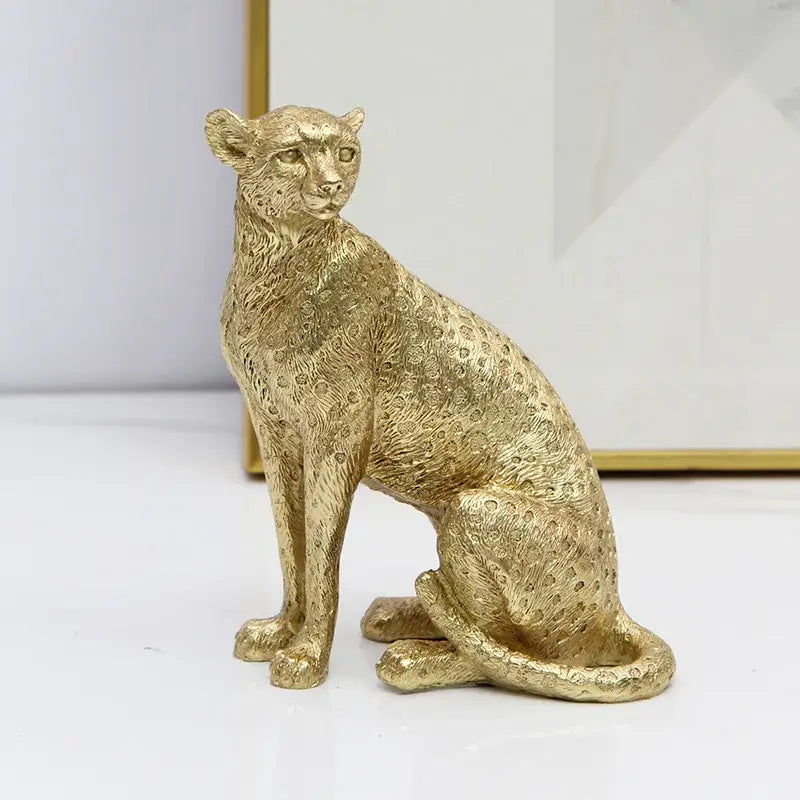 Realistic golden leopard resin crafts figurine with detailed spotted texture and sleek seated posture for office decorbites leopard print decor