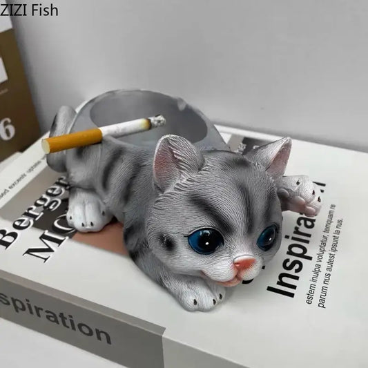 Realistic gray cat resin ash tray with blue eyes and pink nose featuring glossy finish for office table decor