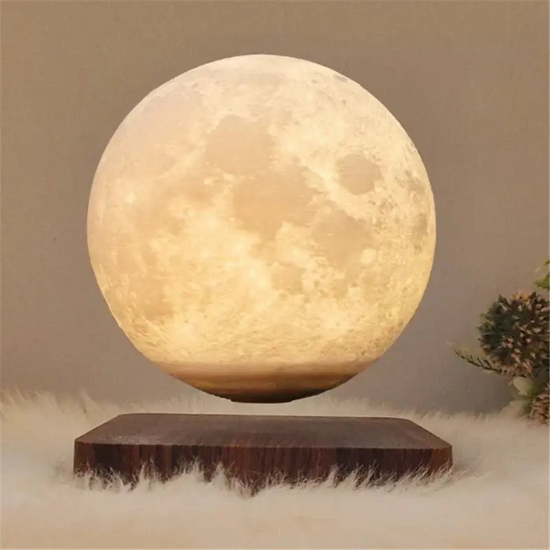 Floating moon lamp with realistic cratered surface glowing warmly on dark wood base for bedroom decorbites levitating moon