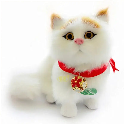 A fluffy white cat dog plush with orange-tipped ears red ribbon collar and gold bell charm for home decor by decorbites