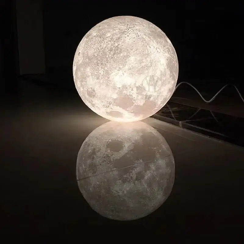 Glowing realistic high polymer moon pendant light with cratered surface and soft white illumination for bedroom cords