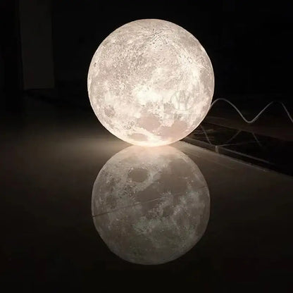 Glowing realistic high polymer moon pendant light with cratered surface and soft white illumination for bedroom cords