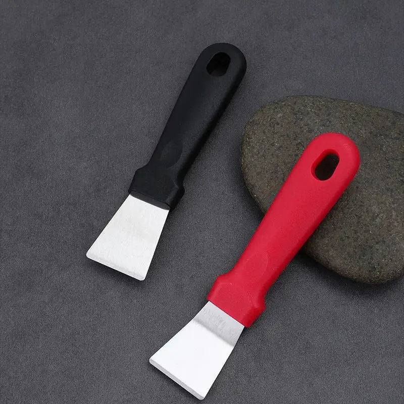 Red and black plastic-handled putty knives with metallic blades for decorbites ice remover tool kitchen shovel use