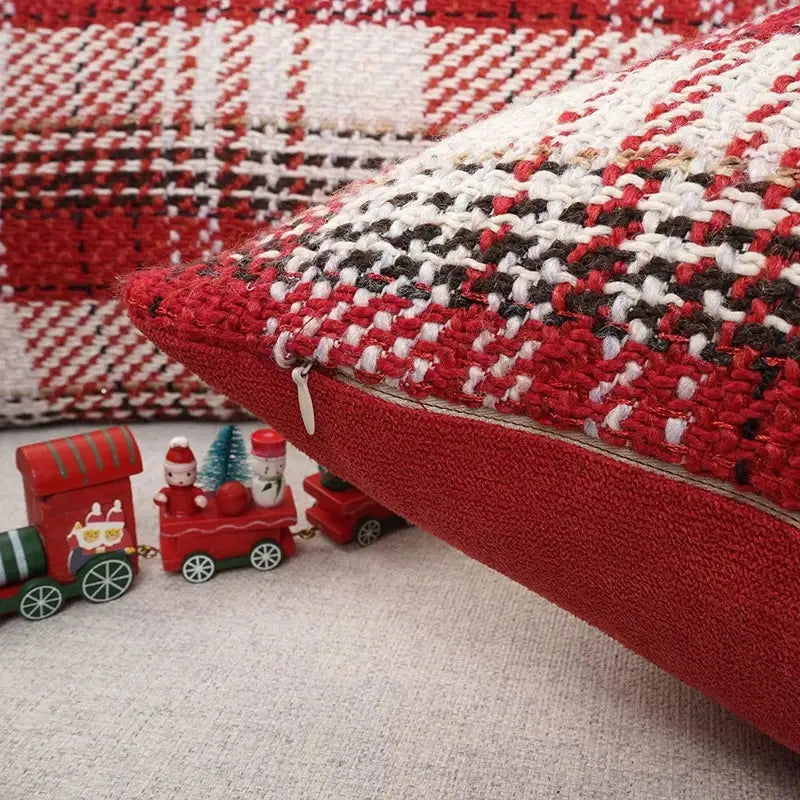 Red and cream buffalo plaid cushion cover with red white and black textured knit pattern from decorbites buffalo decor
