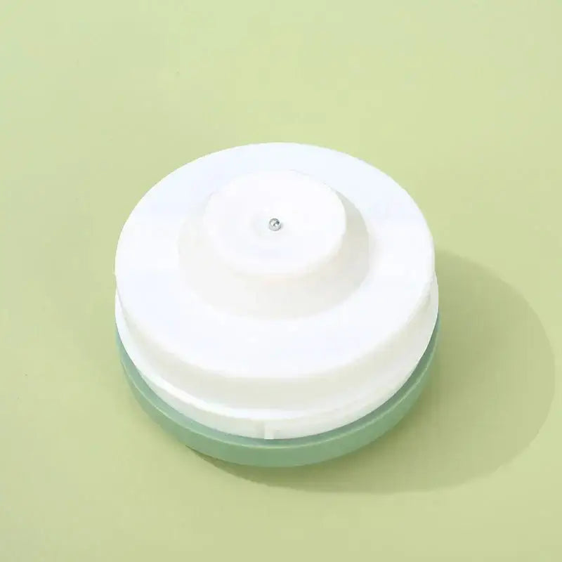 White and mint green plastic lid with central screw hole for a red and mint green insulated water thermos kettle carafe