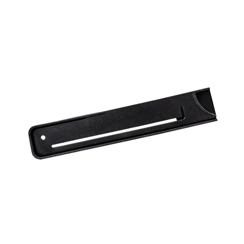 Black plastic phone stand with sleek minimalist design and central slot shown alongside red and silver striped knife blade protector cover kitchen guard