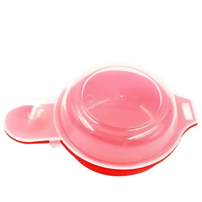 Red and translucent easy eggwich microwave cooker made of pink and red silicone with a clear lid for easy eggwich cooking