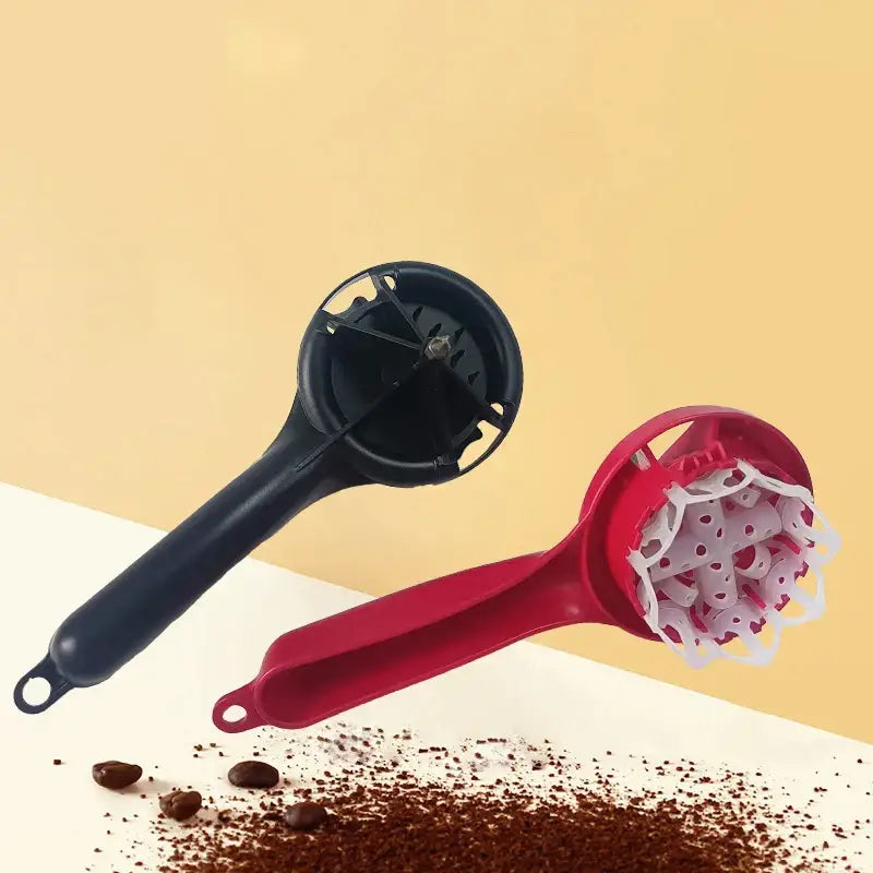 Black and red plastic manual coffee grinders with perforated heads ideal for espresso machine cleaning brush use