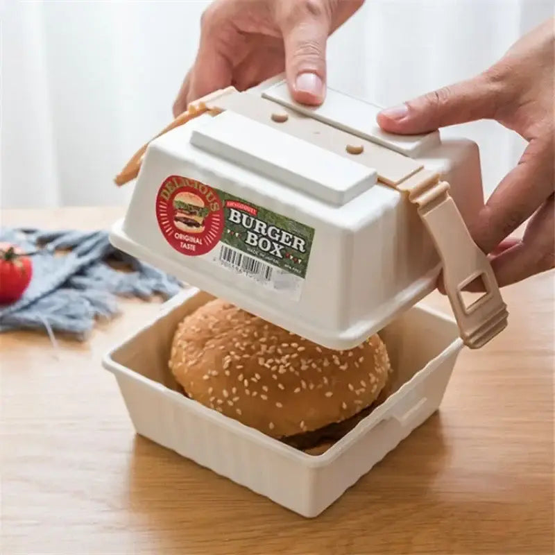 White plastic bento box with hinged lid and beige latch labeled burger box in red and white box set for kitchen picnic storage