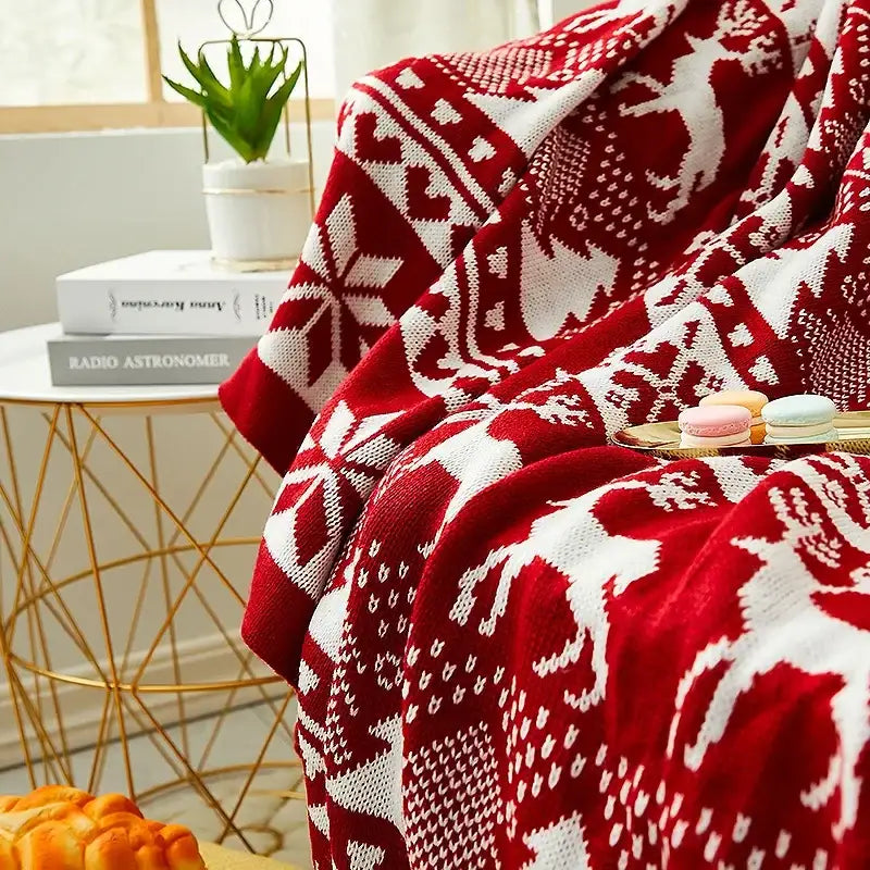 Red and white knitted jacquard christmas blanket with festive reindeer and snowflake patterns for christmas tree decorbites