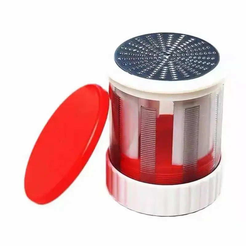 Red and white manual citrus juicer with black textured top and measuring cup ideal for decorbites butter spreadable butter straight use