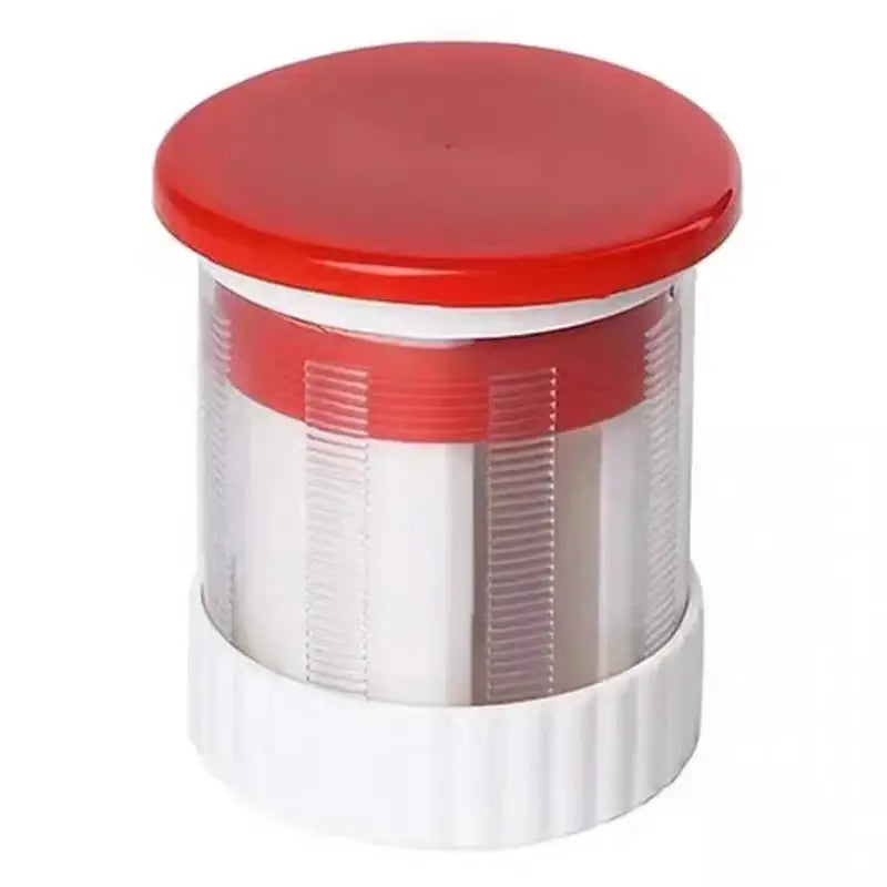 Red and white manual citrus juicer with clear plastic body and ribbed grip for easy use and measuring cup features