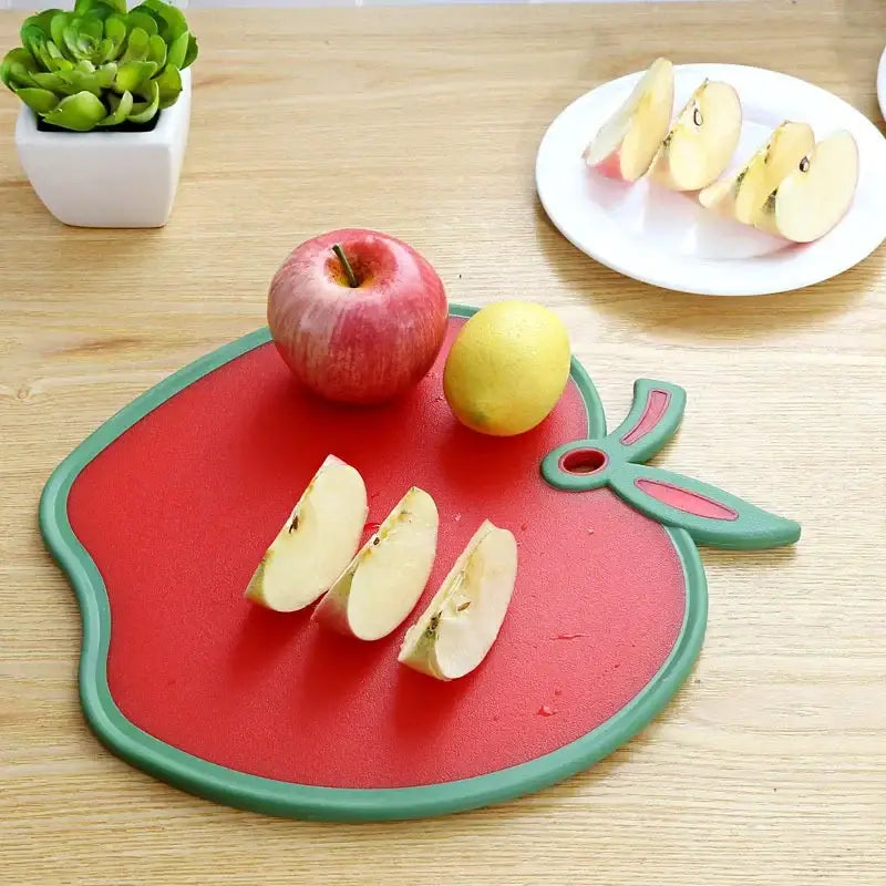 Red apple fruit shape durable cutting board with green border and leaf handle for kitchen serving tray use