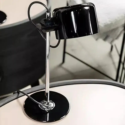 Black glossy ceramic decorbites chrome coupe table lamp with sleek chrome stand and circular base for bedroom decor