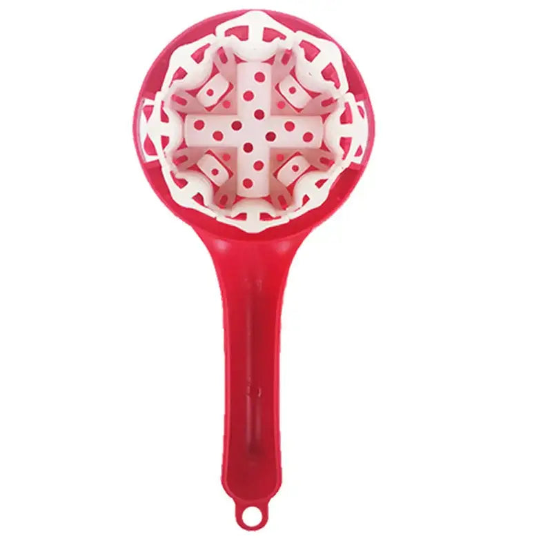 Red plastic fruit strainer with white perforated cross interior for use with decorbites espresso machine brush cleaner