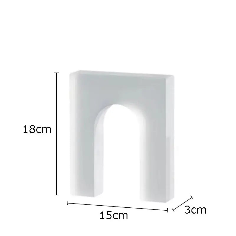 White ceramic crystal arch decor 18cm tall 15cm wide complementing red and blue geometric crystal arch glass sculpture