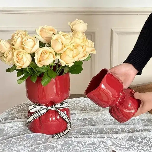 Red Gucci bouquet shape ceramic vase with glossy finish and bow tie detail for living room decorbites bouquet shape decor