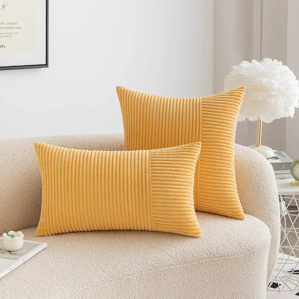 Two mustard-yellow corduroy throw pillows with ribbed texture complement decorbites corduroy patchwork striped cushion covers