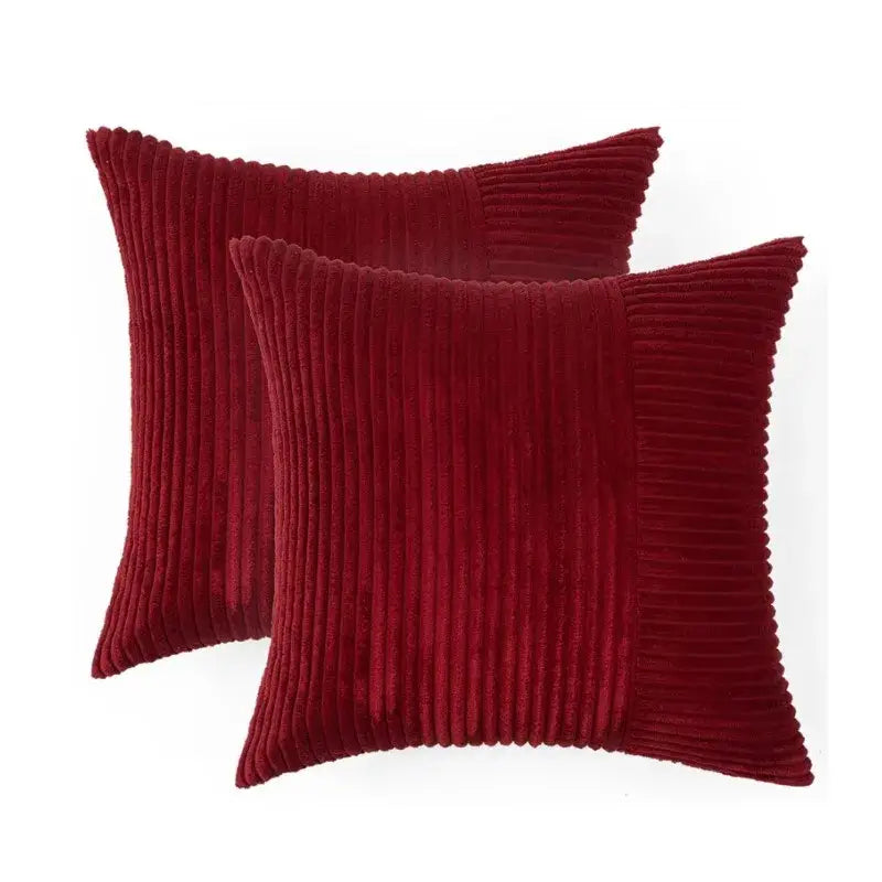 Pair of deep red corduroy patchwork striped cushion covers with ribbed texture and neat edges for living room decorbites