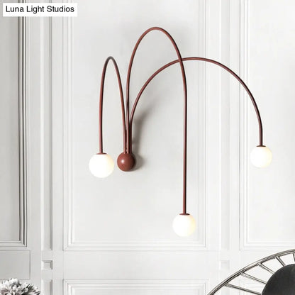 DecorBites™ DecorBites™ Red Curved Arm Sconce with Minimalist Design and Metal Finish for Bedside Lighting