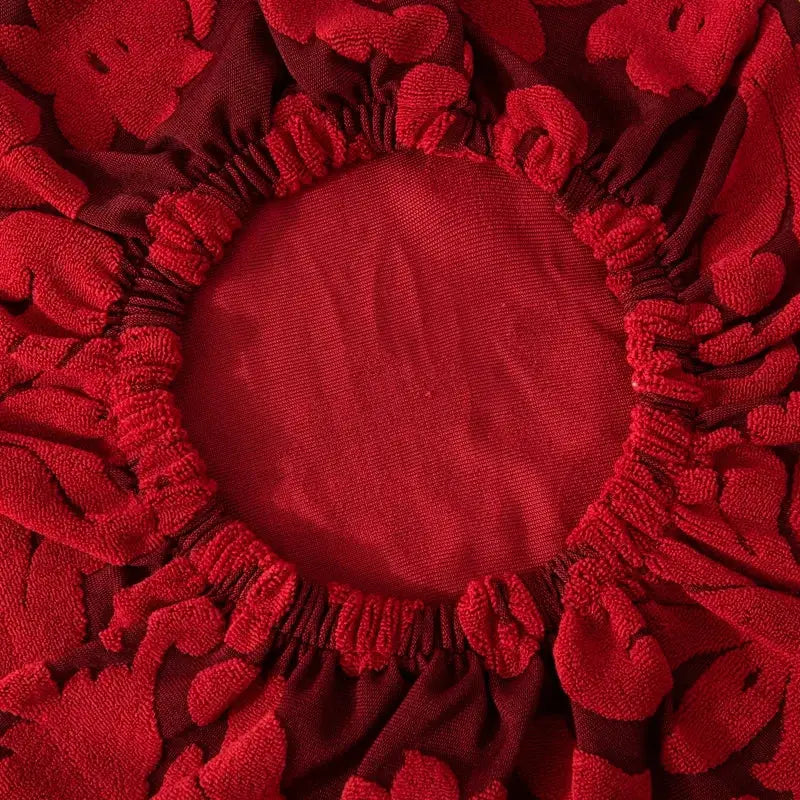 Red embroidered floral jacquard elastic bar chair cover with raised flower designs and gathered circular edge by decorbites jacquard elastic