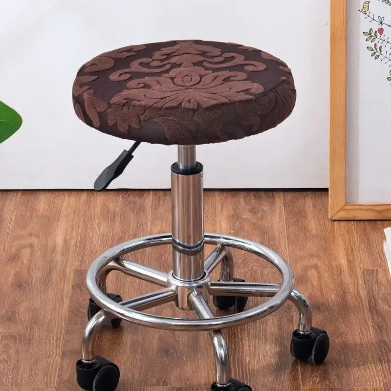 Brown embroidered floral jacquard elastic bar chair cover fitted over chrome finished adjustable stool base decorbites chair cover