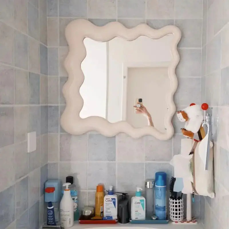 Cream cloud wave mirror with cream color wavy edge and matte finish mounted on tiled walls for bedroom decorbites cream cloud