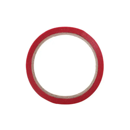 A roll of vibrant red bag seal tape with a smooth matte finish and textured surface for kitchen freshness sealing