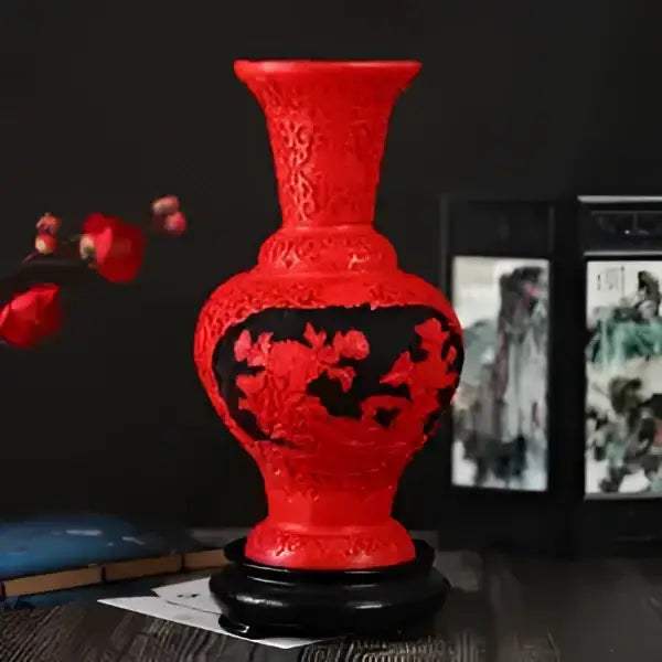 Red lacquerware flower auspicious vase with glossy red ceramic and black floral relief patterns for living room decor