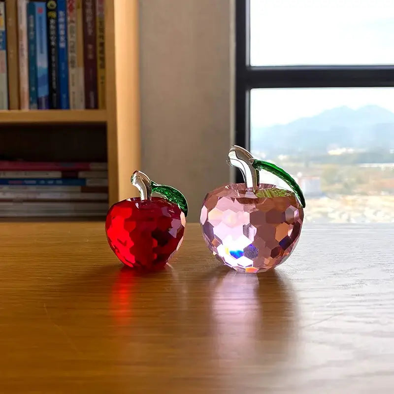 Two decorbites 3d crystal yellow apple figurines in red and shimmering pink with green leaves and metallic stems for office decor