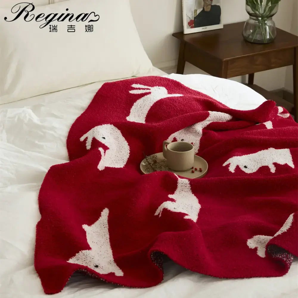 Red regina lively rabbit throw blanket in red knit with white rabbit motifs featuring soft textured fabric for cozy decorbites lively decor